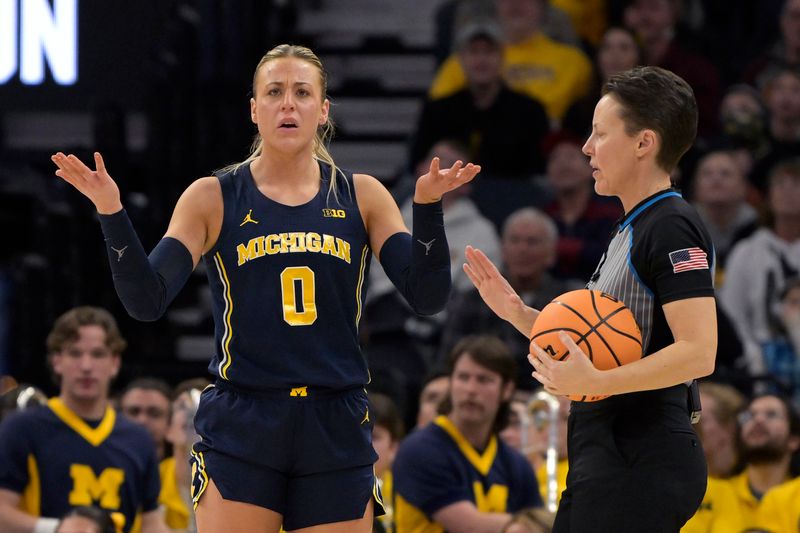 Mar 9, 2024; Minneapolis, MN, USA;  Michigan Wolverines guard Elissa Brett (0) reacts after fouling out of the game against the Iowa Hawkeyes during the second half of a Big Ten Women's Basketball tournament semifinal at Target Center. Mandatory Credit: Nick Wosika-USA TODAY Sports