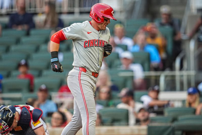 Sep 9, 2024; Cumberland, Georgia, USA; Cincinnati Reds center fielder TJ Friedl (29) reacts after being hit by a pitch against the Atlanta Braves during the second inning at Truist Park. Mandatory Credit: Dale Zanine-Imagn Images