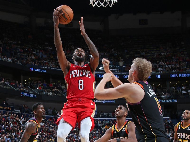 NEW ORLEANS, LA - DECEMBER 9: Naji Marshall #8 of the New Orleans Pelicans drives to the basket against the Phoenix Suns on December 9, 2022 at the Smoothie King Center in New Orleans, Louisiana. NOTE TO USER: User expressly acknowledges and agrees that, by downloading and or using this Photograph, user is consenting to the terms and conditions of the Getty Images License Agreement. Mandatory Copyright Notice: Copyright 2022 NBAE (Photo by Layne Murdoch Jr./NBAE via Getty Images)