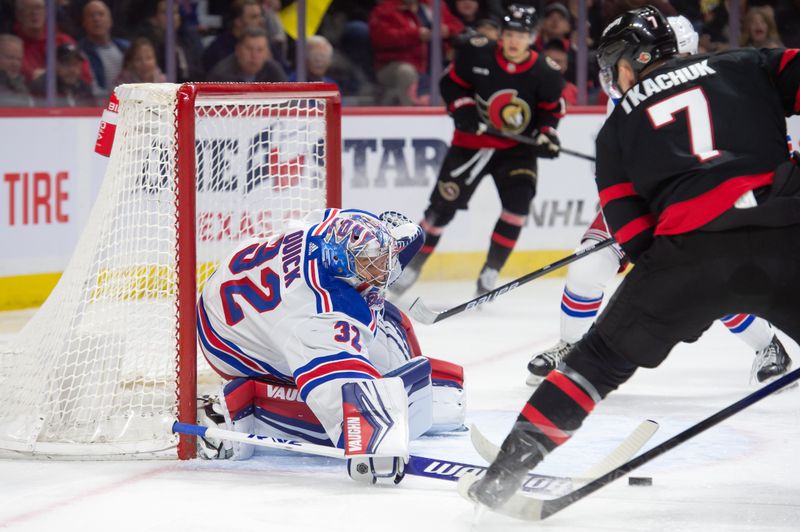 Jan 27, 2024; Ottawa, Ontario, CAN; New York Rangers goalie Jonathan Quick (32) checks the puck away from Ottawa Senators left wing Brady Tkachuk (7) in the first period at the Canadian Tire Centre. Mandatory Credit: Marc DesRosiers-USA TODAY Sports