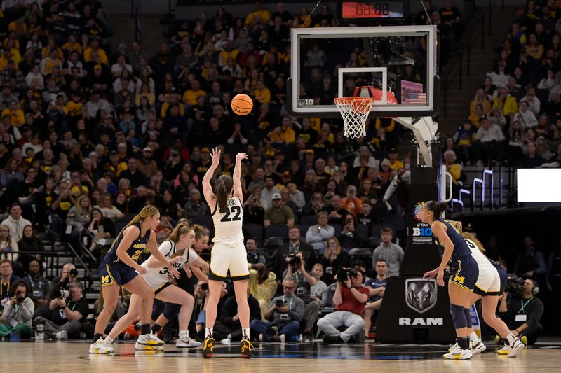 Mar 9, 2024; Minneapolis, MN, USA;  Iowa Hawkeyes guard Caitlin Clark (22) hits a free-throw Michigan Wolverines during the first half of a Big Ten Women's Basketball tournament semifinal at Target Center. Mandatory Credit: Nick Wosika-USA TODAY Sports