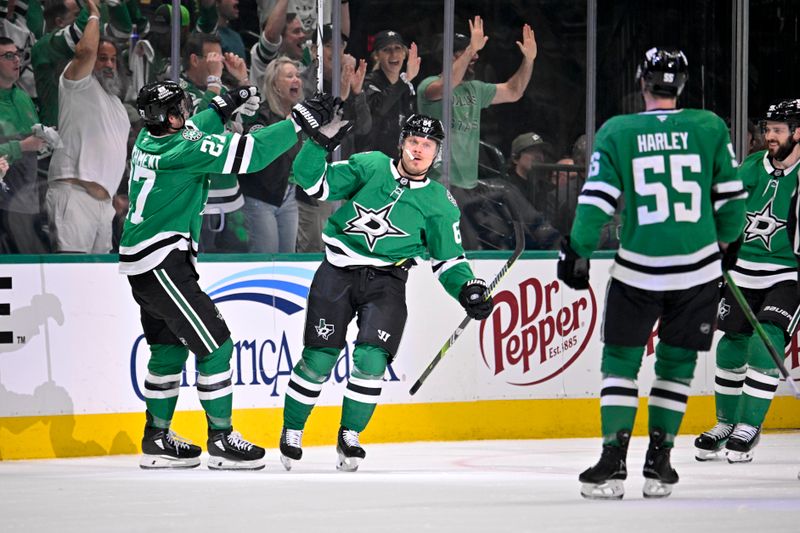 May 13, 2025; Dallas, Texas, USA; Dallas Stars center Mikael Granlund (64) and left wing Mason Marchment (27) and defenseman Thomas Harley (55) and center Tyler Seguin (91) celebrates after Granlund scores a power-play goal against against the Winnipeg Jets during the first period in game four of the second round of the 2025 Stanley Cup Playoffs at American Airlines Center. Mandatory Credit: Jerome Miron-Imagn Images
