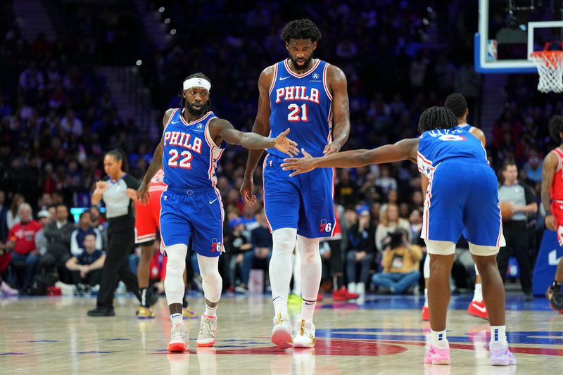 PHILADELPHIA, PENNSYLVANIA - JANUARY 2: Patrick Beverley #22 of the Philadelphia 76ers celebrates with Joel Embiid #21 and Tyrese Maxey #0 against the Chicago Bulls at the Wells Fargo Center on January 2, 2024 in Philadelphia, Pennsylvania. The 76ers defeated the Bulls 110-97. NOTE TO USER: User expressly acknowledges and agrees that, by downloading and or using this photograph, User is consenting to the terms and conditions of the Getty Images License Agreement. (Photo by Mitchell Leff/Getty Images)