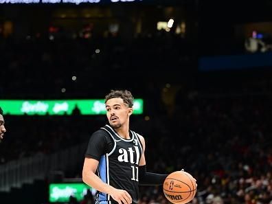 ATLANTA, GA - DECEMBER 23: Trae Young #11 of the Atlanta Hawks dribbles the ball during the game against the Memphis Grizzlies on December 23, 2023 at State Farm Arena in Atlanta, Georgia.  NOTE TO USER: User expressly acknowledges and agrees that, by downloading and/or using this Photograph, user is consenting to the terms and conditions of the Getty Images License Agreement. Mandatory Copyright Notice: Copyright 2023 NBAE (Photo by Adam Hagy/NBAE via Getty Images)