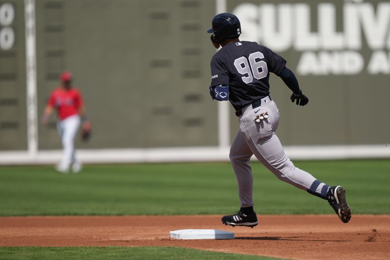 Mar 4, 2026; Fort Myers, Florida, USA; New York Yankees shortstop George Lombard Jr. (96) rounds the bases after hitting a home run in the first inning against the Boston Red Sox at JetBlue Park at Fenway South. Mandatory Credit: Jim Rassol-Imagn Images