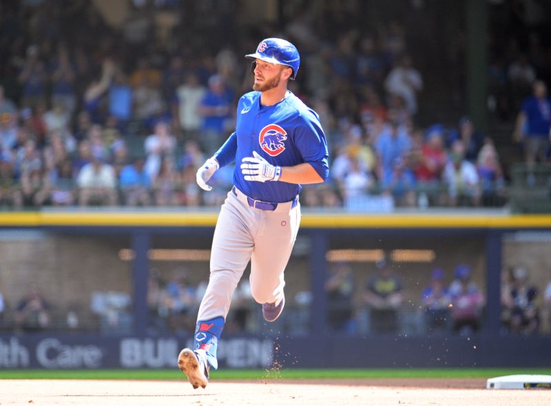 Jun 29, 2024; Milwaukee, Wisconsin, USA; Chicago Cubs first base Michael Busch (29) rounds the bases after hitting a home run against the Milwaukee Brewers in the first inning at American Family Field. Mandatory Credit: Michael McLoone-USA TODAY Sports