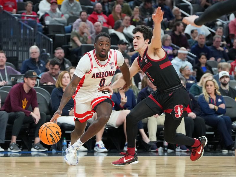 Mar 9, 2023; Las Vegas, NV, USA; Arizona Wildcats guard Courtney Ramey (0) dribbles ahead of Stanford Cardinal guard Isa Silva (1) during the second half at T-Mobile Arena. Mandatory Credit: Stephen R. Sylvanie-USA TODAY Sports