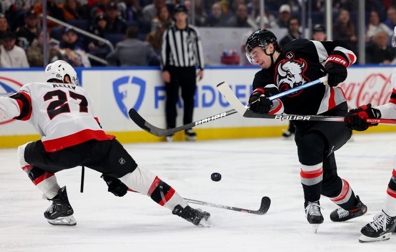 Jan 11, 2024; Buffalo, New York, USA;  Ottawa Senators left wing Parker Kelly (27) blocks a shot by Buffalo Sabres right wing Jack Quinn (22) during the third period at KeyBank Center. Mandatory Credit: Timothy T. Ludwig-USA TODAY Sports