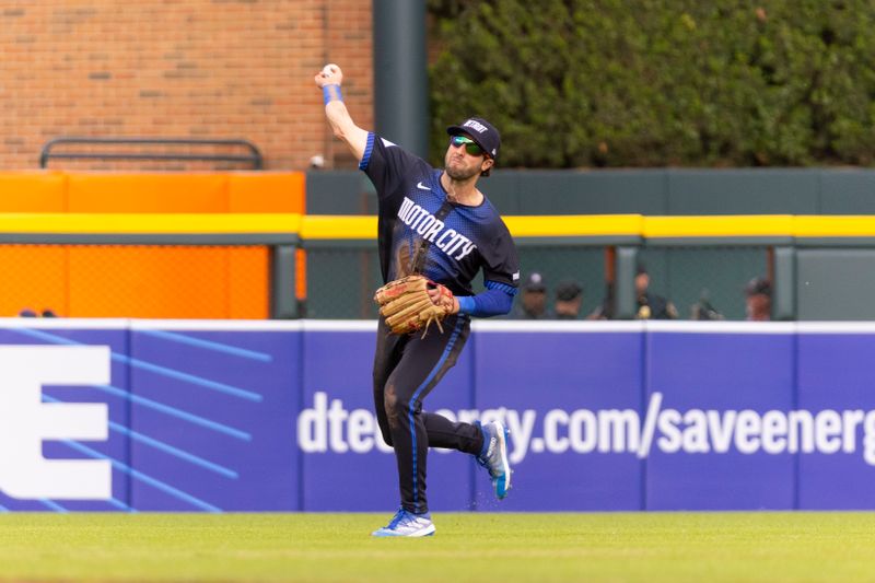 Jun 7, 2024; Detroit, Michigan, USA; Detroit Tigers outfielder Matt Vierling (8) returns the ball to the infield during the game against the Milwaukee Brewers at Comerica Park. Mandatory Credit: Brian Bradshaw Sevald-USA TODAY Sports