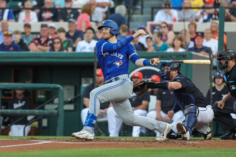 Mar 7, 2024; Lakeland, Florida, USA; Toronto Blue Jays catcher Danny Jansen (9) bats during the first inning against the Detroit Tigers at Publix Field at Joker Marchant Stadium. Mandatory Credit: Mike Watters-USA TODAY Sports