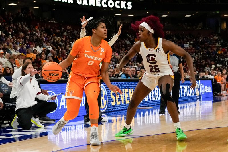 Mar 9, 2024; Greensville, SC, USA; Tennessee Lady Vols guard Jewel Spear (0) handles the ball against South Carolina Gamecocks guard Raven Johnson (25) during the first half at Bon Secours Wellness Arena. Mandatory Credit: Jim Dedmon-USA TODAY Sports