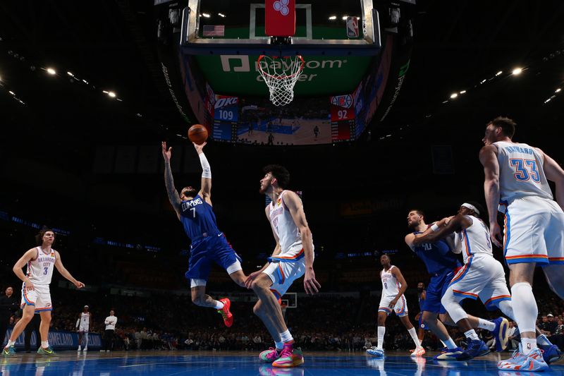 OKLAHOMA CITY, OK - FEBRUARY 22:  Amir Coffey #7 of the LA Clippers drives to the basket during the game against the Oklahoma City Thunder on February 22SF, 2024 at Paycom Arena in Oklahoma City, Oklahoma. NOTE TO USER: User expressly acknowledges and agrees that, by downloading and or using this photograph, User is consenting to the terms and conditions of the Getty Images License Agreement. Mandatory Copyright Notice: Copyright 2024 NBAE (Photo by Zach Beeker/NBAE via Getty Images)