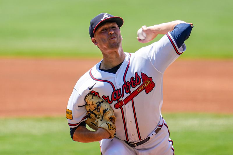 Jun 28, 2023; Cumberland, Georgia, USA; Atlanta Braves starting pitcher Kolby Allard (49) pitches against the Minnesota Twins during the first inning at Truist Park. Mandatory Credit: Dale Zanine-USA TODAY Sports