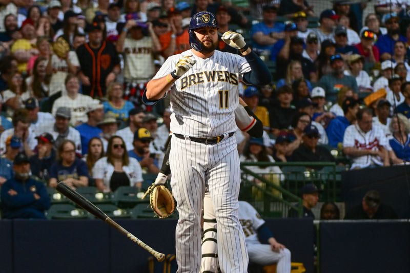 May 27, 2023; Milwaukee, Wisconsin, USA; Milwaukee Brewers first baseman Rowdy Tellez (11) reacts after striking out in the eighth inning during the game against the San Francisco Giants at American Family Field. Mandatory Credit: Benny Sieu-USA TODAY Sports