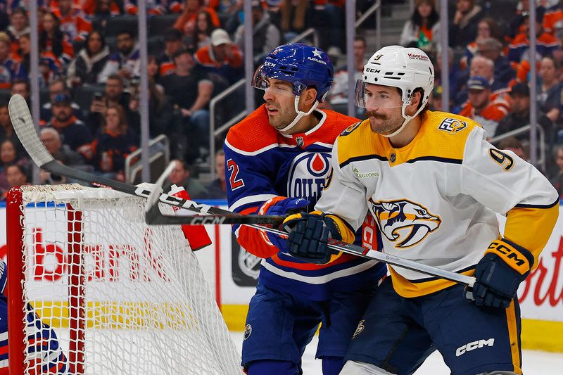 Jan 27, 2024; Edmonton, Alberta, CAN; Edmonton Oilers forward Ryan Nugent-Hopkins (93) and Nashville Predators forward Filip Forsberg (9) battle for position during the second period at Rogers Place. Mandatory Credit: Perry Nelson-USA TODAY Sports