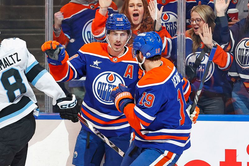 Mar 18, 2025; Edmonton, Alberta, CAN; Edmonton Oilers forward Ryan Nugent-Hopkins (93) celebrates after scoring a goal during the first period against the Utah Hockey Club at Rogers Place. Mandatory Credit: Perry Nelson-Imagn Images