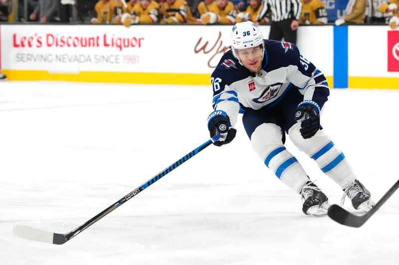 Nov 29, 2024; Las Vegas, Nevada, USA; Winnipeg Jets center Morgan Barron (36) skates against the Vegas Golden Knights during the first period at T-Mobile Arena. Mandatory Credit: Stephen R. Sylvanie-Imagn Images