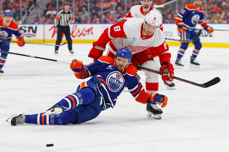 Jan 30, 2025; Edmonton, Alberta, CAN; Detroit Red Wings defensemen Ben Chiarot (8) trips up Edmonton Oilers forward Leon Draisaitl (29) during the first period at Rogers Place. Mandatory Credit: Perry Nelson-Imagn Images