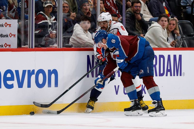 Nov 15, 2024; Denver, Colorado, USA; Colorado Avalanche defenseman Cale Makar (8) and Washington Capitals left wing Alex Ovechkin (8) battle for the puck in the third period at Ball Arena. Mandatory Credit: Isaiah J. Downing-Imagn Images