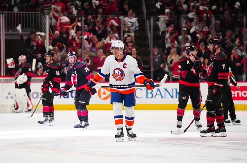 Apr 30, 2024; Raleigh, North Carolina, USA; New York Islanders left wing Anders Lee (27) looks on after Carolina Hurricanes center Seth Jarvis (24) empty net goal during the third period in game five of the first round of the 2024 Stanley Cup Playoffs at PNC Arena. Mandatory Credit: James Guillory-USA TODAY Sports