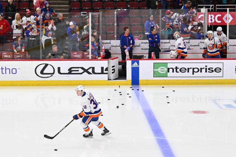 Jan 19, 2024; Chicago, Illinois, USA;  New York Islanders forward Kyle MacLean (32) takes his rookie lap alone on the ice before a game against the Chicago Blackhawks at United Center. MacLean is making his NHL debut.  Mandatory Credit: Jamie Sabau-USA TODAY Sports