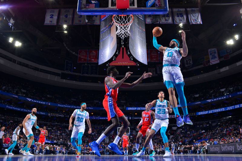 PHILADELPHIA, PA - MARCH 1: Miles Bridges #0 of the Charlotte Hornets rebounds the ball during the game against the Philadelphia 76ers on March 1, 2024 at the Wells Fargo Center in Philadelphia, Pennsylvania NOTE TO USER: User expressly acknowledges and agrees that, by downloading and/or using this Photograph, user is consenting to the terms and conditions of the Getty Images License Agreement. Mandatory Copyright Notice: Copyright 2024 NBAE (Photo by Jesse D. Garrabrant/NBAE via Getty Images)