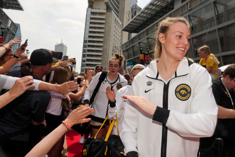 Apr 2, 2023; Dallas, TX, USA; Iowa Hawkeyes forward Shateah Wetering high-fives fans prior to their game against the LSU Lady Tigers during the final round of the Women's Final Four NCAA tournament at the American Airlines Center. Mandatory Credit: Kirby Lee-USA TODAY Sports