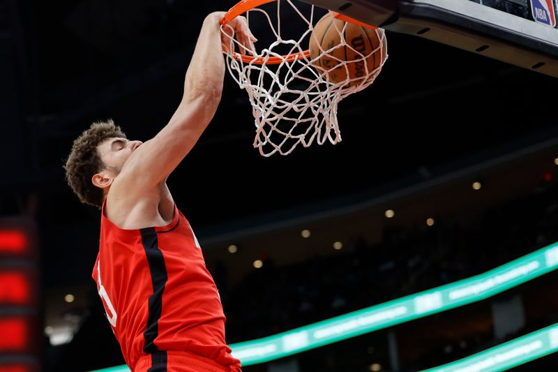 HOUSTON, TEXAS - NOVEMBER 06: Alperen Sengun #28 of the Houston Rockets dunks the ball against the Sacramento Kings during the second half at Toyota Center on November 06, 2023 in Houston, Texas. (Photo by Carmen Mandato/Getty Images)