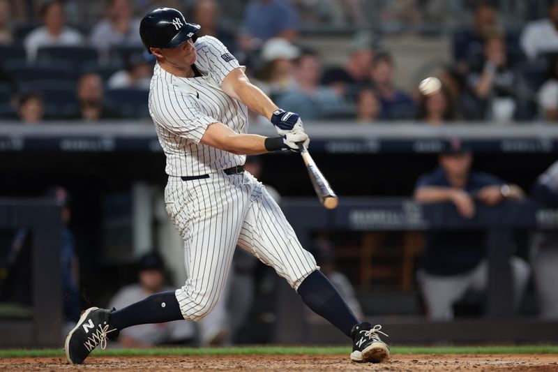 Jul 7, 2024; Bronx, New York, USA; New York Yankees third baseman DJ LeMahieu (26) doubles during the sixth inning against the Boston Red Sox at Yankee Stadium. Mandatory Credit: Vincent Carchietta-USA TODAY Sports