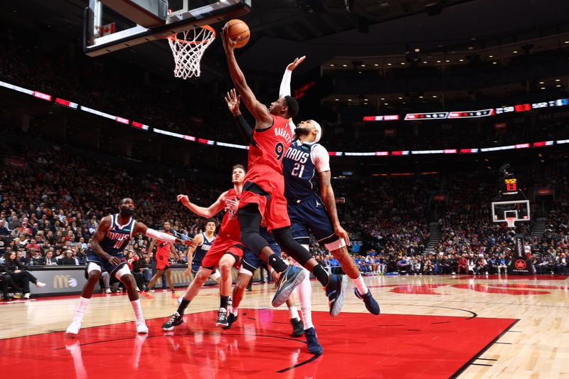 TORONTO, CANADA - FEBRUARY 28: RJ Barrett #9 of the Toronto Raptors drives to the basket during the game against the Dallas Mavericks on February 28, 2024 at the Scotiabank Arena in Toronto, Ontario, Canada.  NOTE TO USER: User expressly acknowledges and agrees that, by downloading and or using this Photograph, user is consenting to the terms and conditions of the Getty Images License Agreement.  Mandatory Copyright Notice: Copyright 2024 NBAE (Photo by Vaughn Ridley/NBAE via Getty Images)