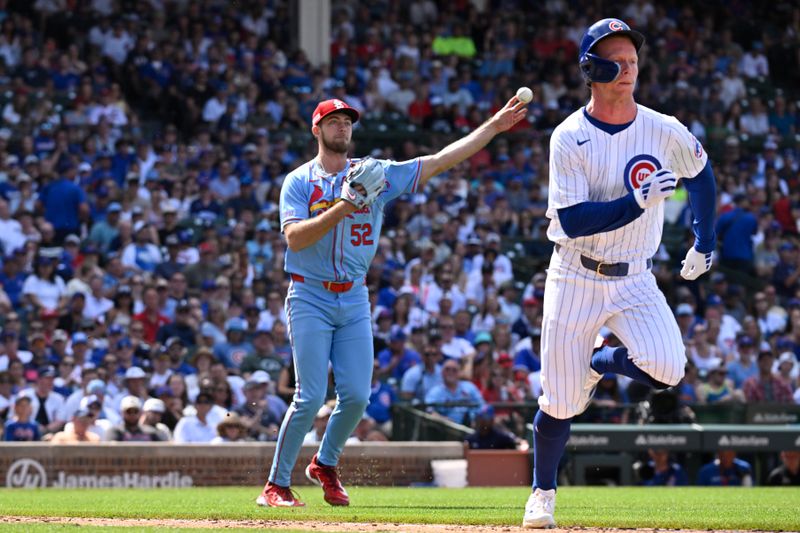 Jun 15, 2024; Chicago, Illinois, USA;  St. Louis Cardinals pitcher Matthew Liberatore (52) throws out Chicago Cubs outfielder Pete Crow-Armstrong (52) after he bunted during the eighth inning at Wrigley Field. Mandatory Credit: Matt Marton-USA TODAY Sports