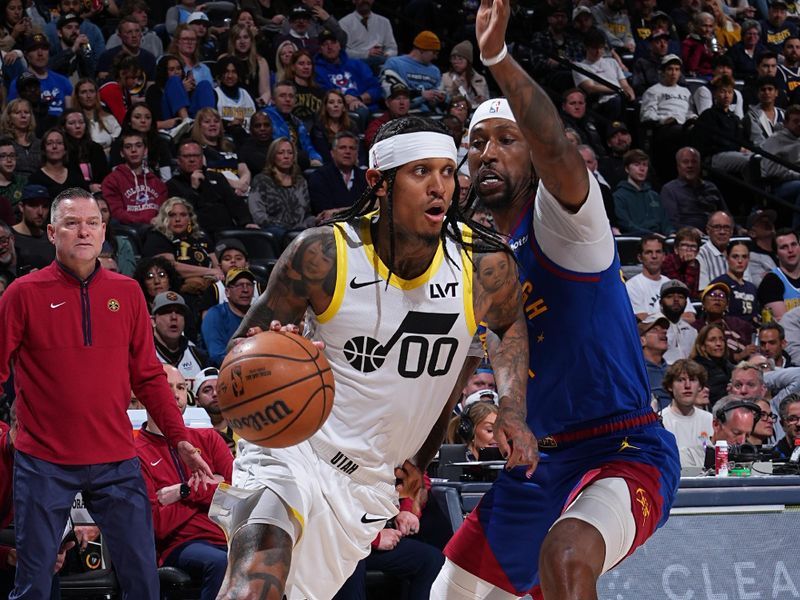 DENVER, CO - MARCH 9: Jordan Clarkson #00 of the Utah Jazz drives to the basket during the game against the Denver Nuggets on March 9, 2024 at the Ball Arena in Denver, Colorado. NOTE TO USER: User expressly acknowledges and agrees that, by downloading and/or using this Photograph, user is consenting to the terms and conditions of the Getty Images License Agreement. Mandatory Copyright Notice: Copyright 2024 NBAE (Photo by Garrett Ellwood/NBAE via Getty Images)