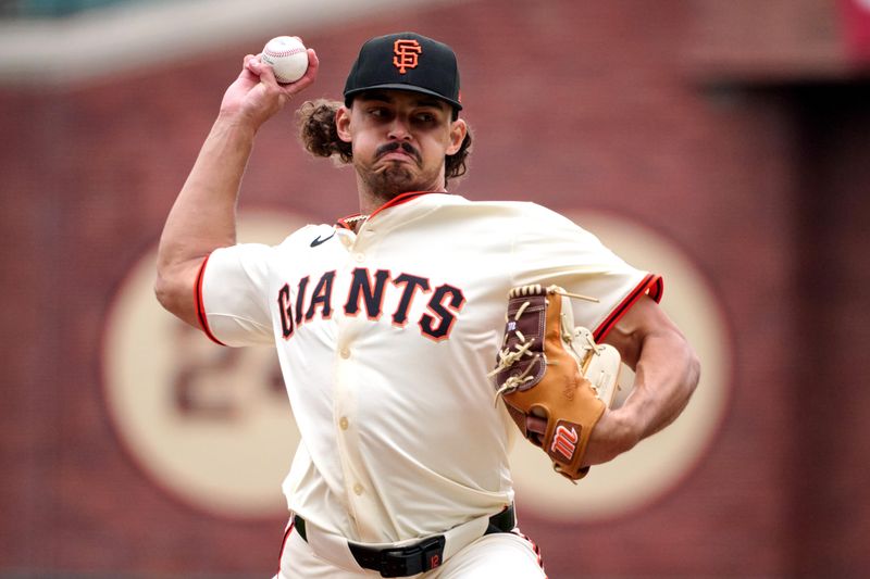 Apr 27, 2025; San Francisco, California, USA; San Francisco Giants starting pitcher Jordan Hicks (12) throws a pitch against the Texas Rangers during the first inning at Oracle Park. Mandatory Credit: Robert Edwards-Imagn Images