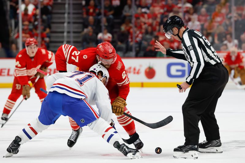 Oct 9, 2025; Detroit, Michigan, USA;  Montréal Canadiens center Jake Evans (71) and Detroit Red Wings center Michael Rasmussen (27) face off in the second period at Little Caesars Arena. Mandatory Credit: Rick Osentoski-Imagn Images