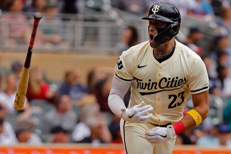 Jun 12, 2024; Minneapolis, Minnesota, USA; Minnesota Twins designated hitter Royce Lewis (23) flips the bat and yells to his dugout on his two-run home run against the Colorado Rockies in the sixth inning at Target Field. Mandatory Credit: Bruce Kluckhohn-USA TODAY Sports