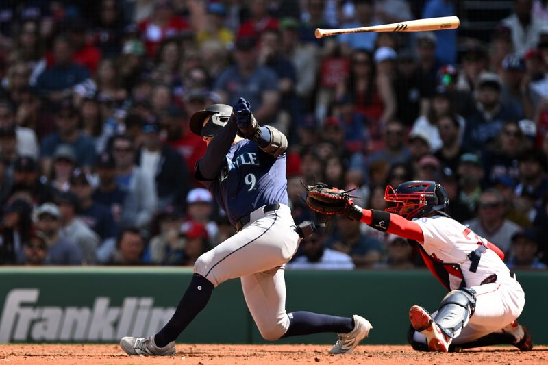 Apr 24, 2025; Boston, Massachusetts, USA; Seattle Mariners third base Ben Williamson (9) throws the bat during an at bat against the Boston Red Sox in the fifth inning at Fenway Park. Mandatory Credit: Brian Fluharty-Imagn Images