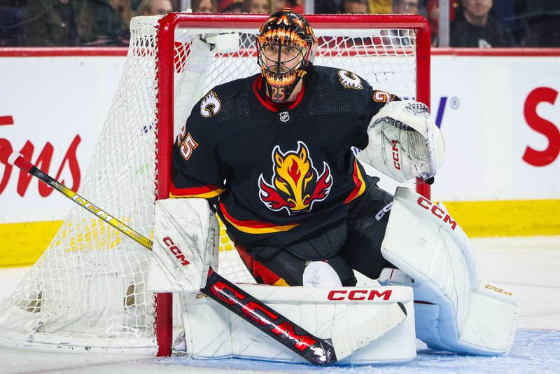 Jan 27, 2024; Calgary, Alberta, CAN; Calgary Flames goaltender Jacob Markstrom (25) guards his net against the Chicago Blackhawks during the third period at Scotiabank Saddledome. Mandatory Credit: Sergei Belski-USA TODAY Sports