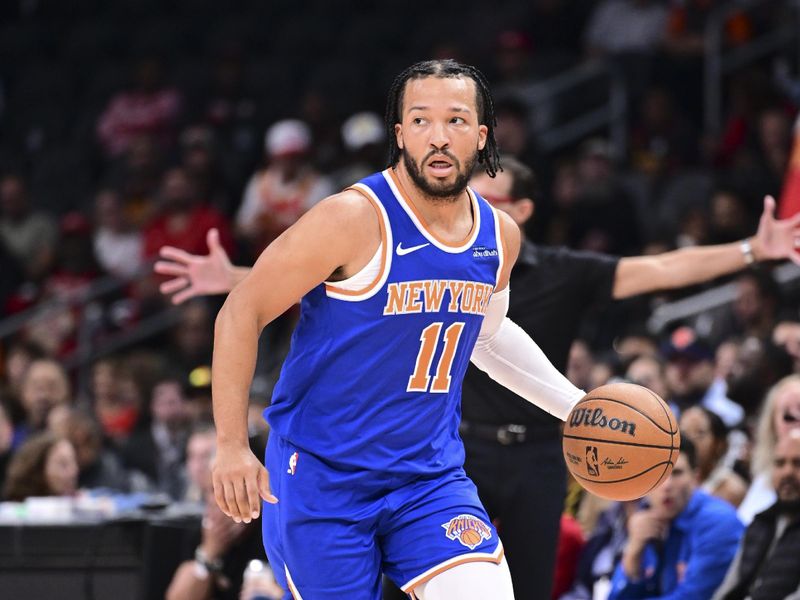 ATLANTA, GA - November 6:  Jalen Brunson #11 of the New York Knicks dribbles the ball during the game against the Atlanta Hawks on November 6, 2024 at State Farm Arena in Atlanta, Georgia.  NOTE TO USER: User expressly acknowledges and agrees that, by downloading and/or using this Photograph, user is consenting to the terms and conditions of the Getty Images License Agreement. Mandatory Copyright Notice: Copyright 2024 NBAE (Photo by Adam Hagy/NBAE via Getty Images)