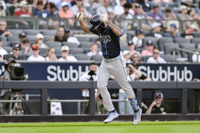 Jul 21, 2024; Bronx, New York, USA; Tampa Bay Rays outfielder Jose Siri (22) rounds the bases after hitting a two-run home run against the New York Yankees during the seventh inning at Yankee Stadium. Mandatory Credit: John Jones-USA TODAY Sports