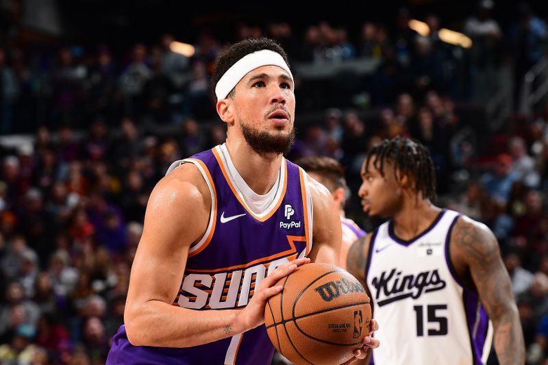 PHOENIX, AZ - FEBRUARY 13: Devin Booker #1 of the Phoenix Suns shoots a free throw during the game against the Sacramento Kings on February 13, 2024 at Footprint Center in Phoenix, Arizona. NOTE TO USER: User expressly acknowledges and agrees that, by downloading and or using this photograph, user is consenting to the terms and conditions of the Getty Images License Agreement. Mandatory Copyright Notice: Copyright 2024 NBAE (Photo by Kate Frese/NBAE via Getty Images)