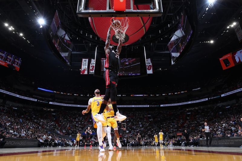 MIAMI, FL - DECEMBER 4: Jimmy Butler #22 of the Miami Heat dunks the ball during the game against the Los Angeles Lakers on December 4, 2024 at Kaseya Center in Miami, Florida. NOTE TO USER: User expressly acknowledges and agrees that, by downloading and or using this Photograph, user is consenting to the terms and conditions of the Getty Images License Agreement. Mandatory Copyright Notice: Copyright 2024 NBAE (Photo by Joe Murphy/NBAE via Getty Images)