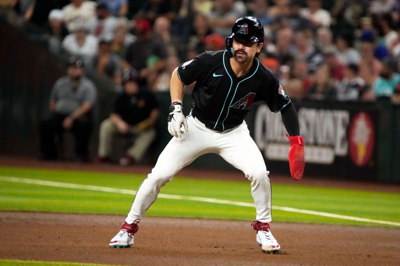 Jun 3, 2024; Phoenix, Arizona, USA; Arizona Diamondbacks outfielder Corbin Carroll (7) leads off first-base against the San Francisco Giants in the seventh inning at Chase Field. Mandatory Credit: Rick Scuteri-USA TODAY Sports