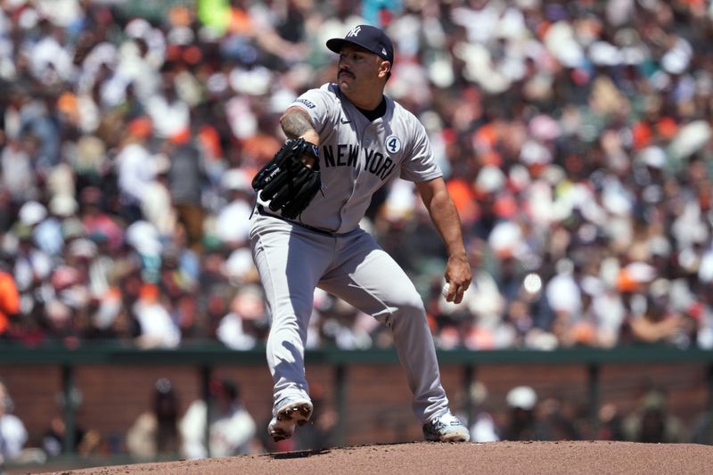 Jun 2, 2024; San Francisco, California, USA; New York Yankees starting pitcher Nestor Cortes (65) throws a pitch against the San Francisco Giants during the first inning at Oracle Park. Mandatory Credit: Darren Yamashita-USA TODAY Sports