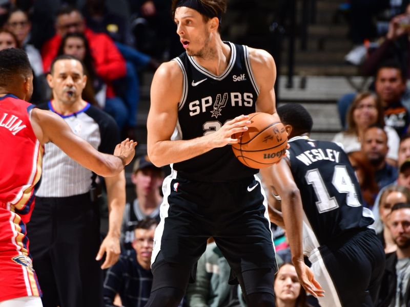 SAN ANTONIO, TX - FEBRUARY 2: Zach Collins #23 of the San Antonio Spurs handles the ball during the game against the New Orleans Pelicans on February 2, 2024 at the Frost Bank Center in San Antonio, Texas. NOTE TO USER: User expressly acknowledges and agrees that, by downloading and or using this photograph, user is consenting to the terms and conditions of the Getty Images License Agreement. Mandatory Copyright Notice: Copyright 2024 NBAE (Photos by Barry Gossage/NBAE via Getty Images)