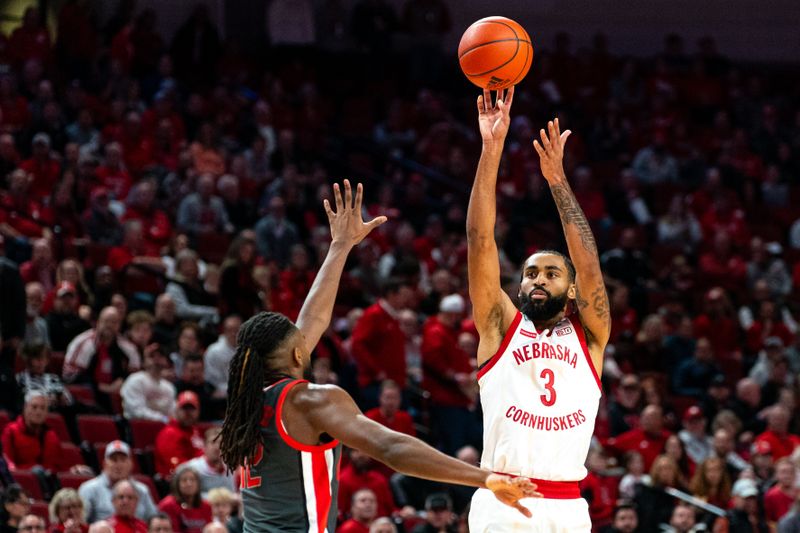 Jan 23, 2024; Lincoln, Nebraska, USA; Nebraska Cornhuskers guard Brice Williams (3) shoots a 3-point shot against the Ohio State Buckeyes during the first half at Pinnacle Bank Arena. Mandatory Credit: Dylan Widger-USA TODAY Sports