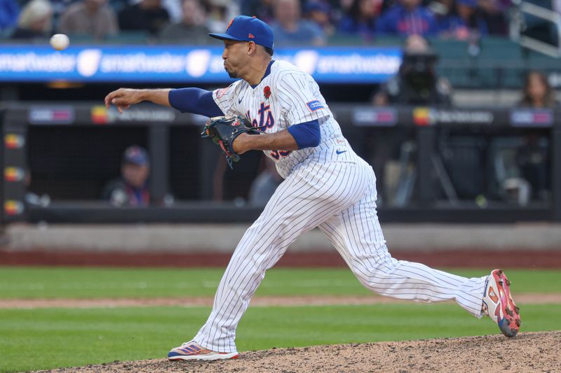 May 26, 2025; New York City, New York, USA; New York Mets relief pitcher Edwin Diaz (39) delivers a pitch during the ninth inning against the Chicago White Sox at Citi Field. Mandatory Credit: Vincent Carchietta-Imagn Images
