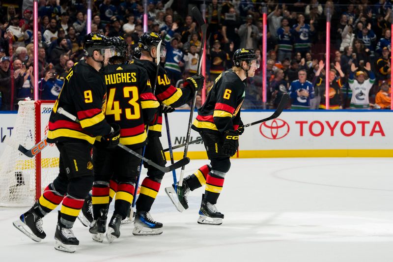 Nov 6, 2023; Vancouver, British Columbia, CAN; Vancouver Canucks forward J.T. Miller (9), defenseman Quinn Hughes (43), forward Elias Pettersson (40) and forward Brock Boeser (6) celebrate Boeser   s goal against the Edmonton Oilers in the first period at Rogers Arena. Mandatory Credit: Bob Frid-USA TODAY Sports