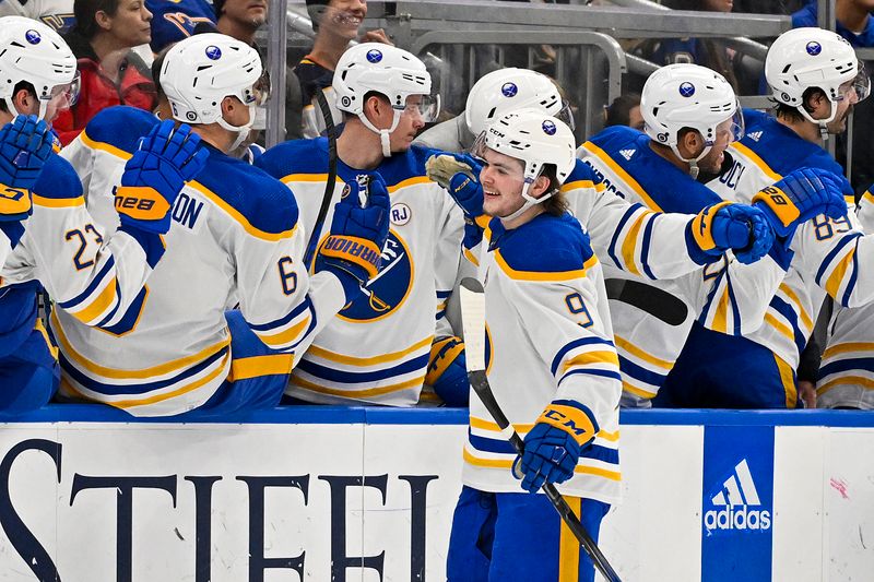 Nov 30, 2023; St. Louis, Missouri, USA;  Buffalo Sabres left wing Zach Benson (9) is congratulated by teammates after scoring against the St. Louis Blues during the second period at Enterprise Center. Mandatory Credit: Jeff Curry-USA TODAY Sports