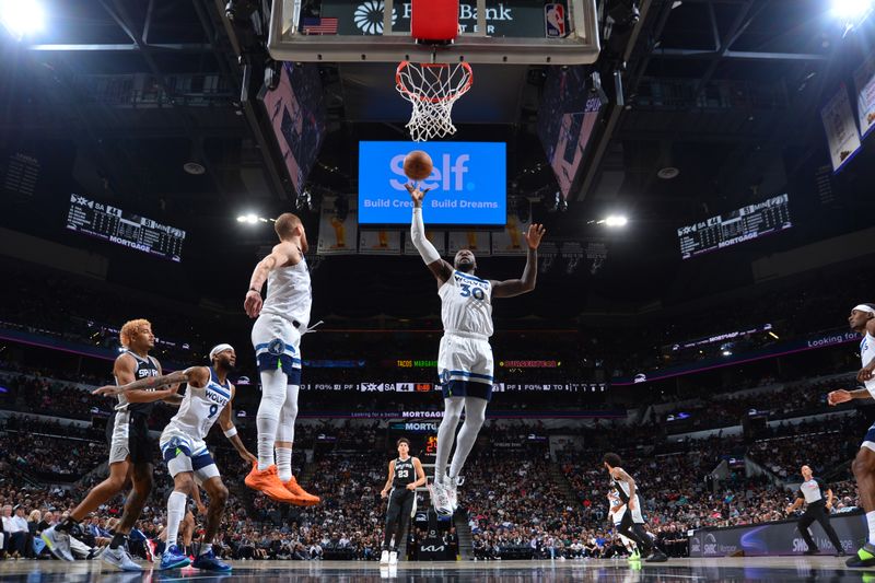 SAN ANTONIO, TX - NOVEMBER 2: Julius Randle #30 of the Minnesota Timberwolves goes up for the rebound during the game against the San Antonio Spurs on November 2, 2024 at the Frost Bank Center in San Antonio, Texas. NOTE TO USER: User expressly acknowledges and agrees that, by downloading and or using this photograph, user is consenting to the terms and conditions of the Getty Images License Agreement. Mandatory Copyright Notice: Copyright 2024 NBAE (Photos by Michael Gonzales/NBAE via Getty Images)