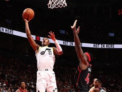 TORONTO, CANADA - DECEMBER 23:  Kris Dunn #11 of the Utah Jazz drives to the basket during the game against the Toronto Raptors n December 23, 2023 at the Scotiabank Arena in Toronto, Ontario, Canada.  NOTE TO USER: User expressly acknowledges and agrees that, by downloading and or using this Photograph, user is consenting to the terms and conditions of the Getty Images License Agreement.  Mandatory Copyright Notice: Copyright 2023 NBAE (Photo by Vaughn Ridley/NBAE via Getty Images)